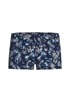 Miesten laivastonsiniset uimapuvut, joissa on abstrakti sininen ja harmaa kukkakuvio ja pieni logo oikeassa alakulmassa.