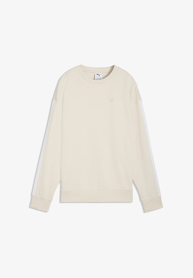 Sweat-shirt beige à manches longues avec des rayures blanches sur les manches et un petit logo Puma sur le côté gauche de la poitrine.