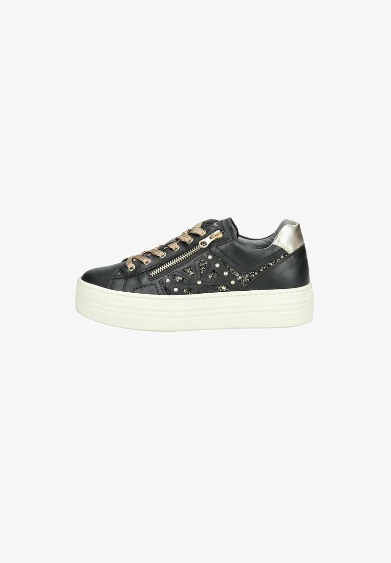Black leather sneaker with metallic accents, decorative side zipper, textured design, beige laces, and a chunky white sole.
