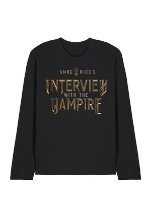 Black long-sleeve shirt with gold metallic text reading "Anne Rice's Interview with the Vampire" centered on the front.