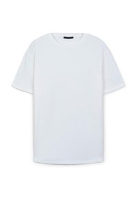 T-shirt bianco a maniche corte realizzato in tessuto a coste, con scollatura rotonda e vestibilità rilassata. Texture liscia, senza motivi o decorazioni.