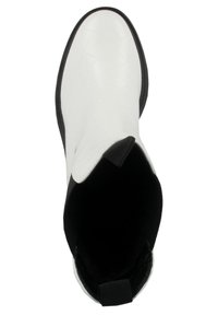 White leather ankle boot with textured surface, elastic side panels, and a black rubber sole. Features a classic Chelsea boot design.