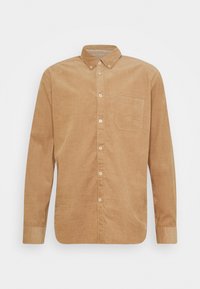 Camicia in corduroy marrone con maniche lunghe, colletto button-down, taschino anteriore e bottoni chiari. Tessuto testurizzato con righe verticali.