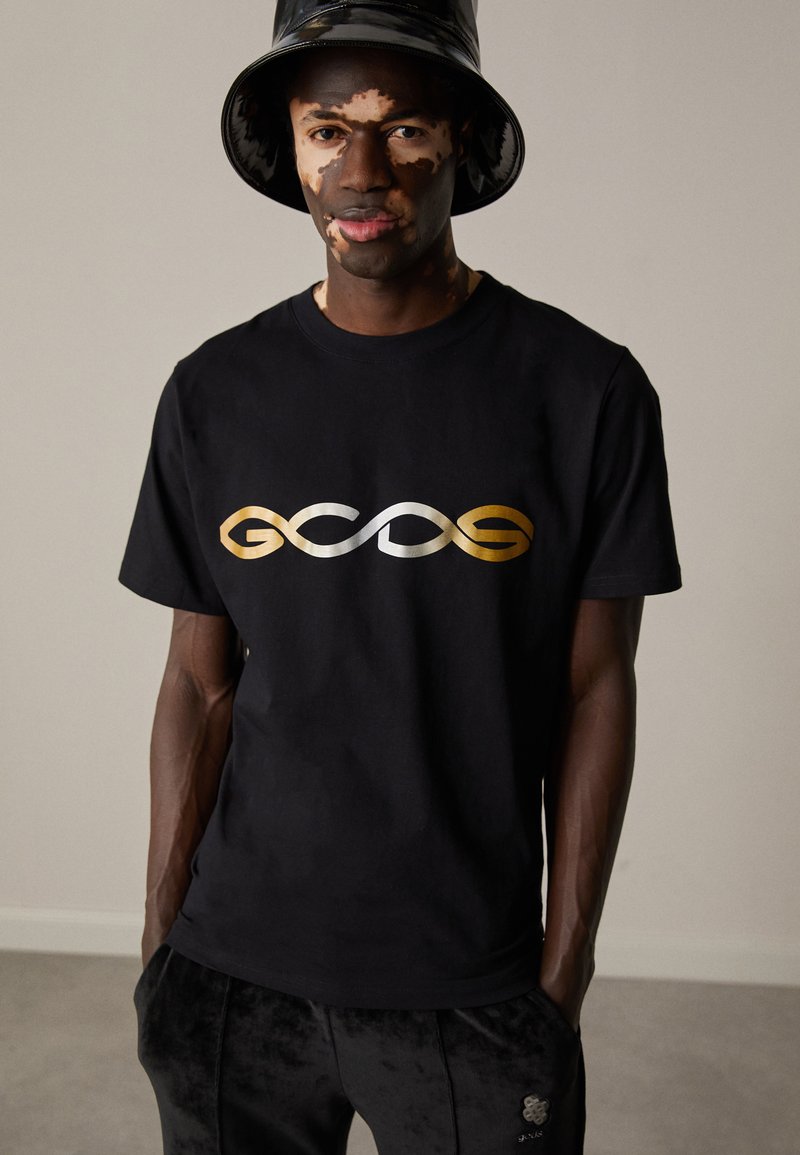 GCDS T-shirt Nera Con Logo Z0MLQC109J101/999B Unisex main image 1