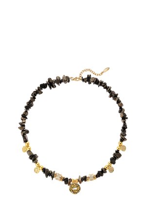 Schwarze Steinperlenkette mit goldfarbenen Akzenten und dekorativen Elementen, die unregelmäßige Formen und strukturierte Oberflächen aufweist.