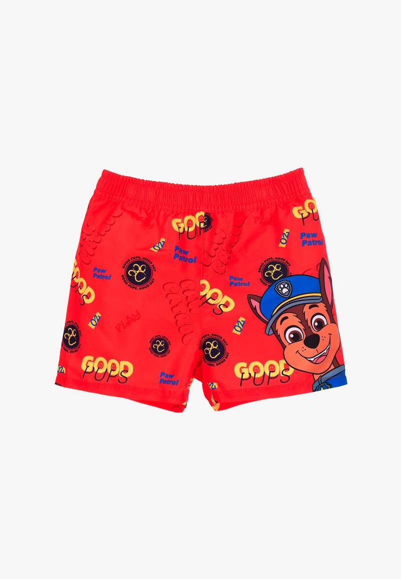Pantaloni da bagno rossi con elastico in vita, che presentano un cane dei cartoni animati in uniforme di polizia, e il testo "Buoni Cagnolini" e "Paw Patrol".
