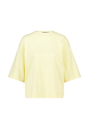 Light yellow oversized short-sleeve t-shirt with a round neckline and a slightly cropped hem.