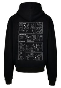 Felpa nera con cappuccio che presenta disegni tecnici bianchi sul retro, dettagliando elementi costruttivi per una figura, inclusi linee e istruzioni.