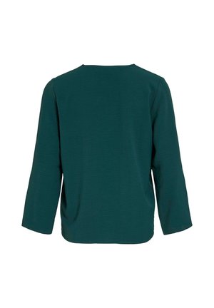 Haut à manches longues teal en tissu texturé. Présente un col rond et une coupe décontractée avec des coutures d'épaule basses, sans fermetures visibles.