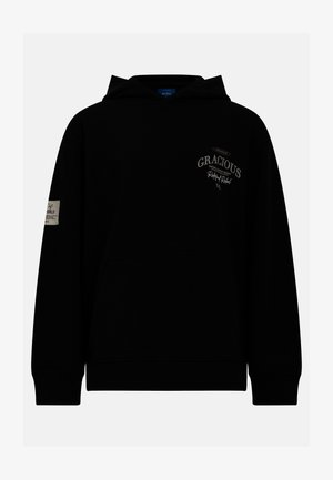 Hoodie noir en tissu doux, doté d'une poche frontale, d'une capuche à cordon de serrage et d'impressions indiquant "GRACIOUS" et "Rebel Rebel" sur la poitrine.