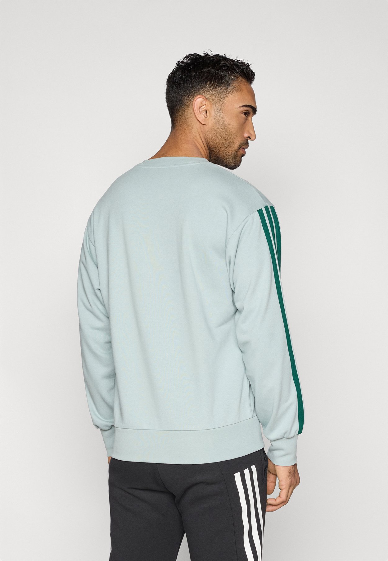 ESSENTIALS THREE STRIPES FRENCH TERRY