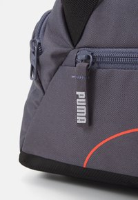 Puma FUNDAMENTALS BAG XS UNISEX - Športna torba - galactic gray