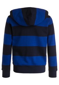 Hoodie med horisontella blå och marinblå ränder, tillverkad av mjukt material, med elastiska muddar och nederkant för en tätt passform.