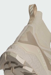adidas Performance FREE  beżowy