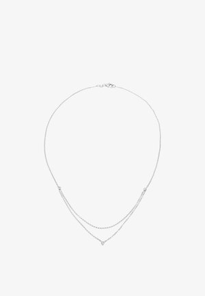 Schichtige silberne Halskette mit zarten Kettengliedern, die zwei kleine runde Akzente aufweist. Einfaches Design und polierte Oberfläche.