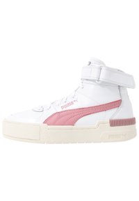 High-top sneaker in white leather with pink accents. Features a textured rubber sole, lace-up front, and ankle strap for support.