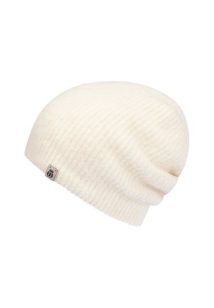 Cream-colored ribbed knit beanie with a small rectangular logo tag on the side, displayed on a white background.