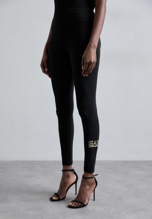 Legging (type pantalon) - black/gold-coloured