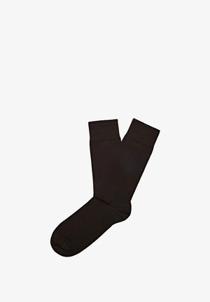 Calze nere in cotone con una texture liscia, lunghezza fino al polpaccio e polsini a costine. Design della punta senza cuciture per comfort e durata.