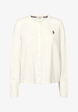 Hvit cardigan laget av mykt strikkestoff. Har rund hals, knapper foran og brodert logo på venstre bryst. Lange ermer.