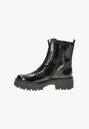 Bottines en cuir verni noir avec une semelle en caoutchouc épaisse, deux zips latéraux et une languette à l'arrière pour un enfilage facile.