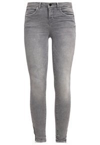 Jeans grigi, skinny fit, realizzati in denim, con una finitura sbiadita, design a cinque tasche e sottili dettagli con zip all'orlo delle caviglie.