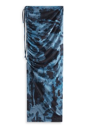 Jupe froncée à motif floral bleu et noir avec des liens latéraux réglables, présentée à plat sur fond blanc.