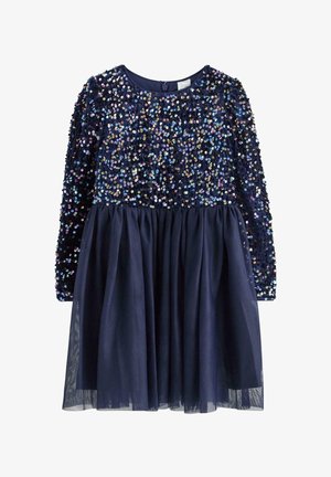 Marineblaues Kleid mit langen Ärmeln, verziert mit mehrfarbigen Pailletten auf dem Oberteil und einem Tüllrock. Rundkragen, Knopfverschluss auf der Rückseite.
