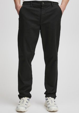 ERICO FILIP  - Trousers - true black