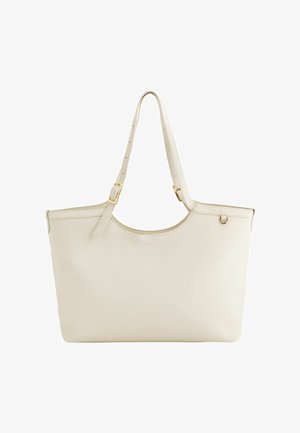 Cremefarbene Leder-Shopper-Tasche mit zwei verstellbaren Schulterriemen und goldfarbenen Schnallendetails, gezeigt vor weißem Hintergrund.