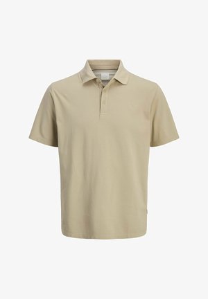 Beez värvi polo särk, mis on valmistatud puuvillast, esitleb klassikalist nööbiga krae, lühikesi varukaid ja diskreetset logo rinnal.