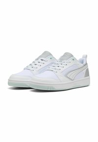 White sneakers with gray accents, featuring a smooth leather and textile upper, flat laces, and a translucent mint green sole.