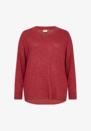 Sarkans garām piedurknēm, brīvā piegriezumā, ar V-veida kakla izgriezumu un struktūru saturošu, melnām auduma. Iezīmes ietver izliekto apakšmalu un bez redzamiem stiprinājumiem.