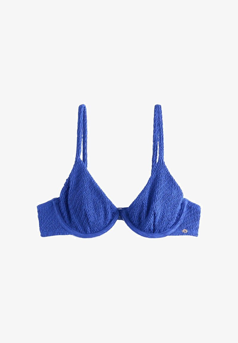 Blue textured underwire bra with adjustable shoulder straps and small gold logo on the side band, on white background.