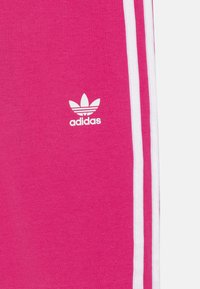 adidas Originals FLAI  - Legíny - kalhoty  - semi lucid fuchsia
