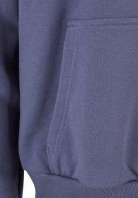 Navy blue hoodie with textured fabric, featuring a front kangaroo pocket and ribbed cuffs and hem, highlighting a casual design.