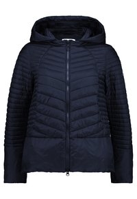 Chaqueta acolchada de color navy con capucha, que presenta un diseño de chevrón acolchado, cierre completo con cremallera y mangas acanaladas para mayor textura yCalor.