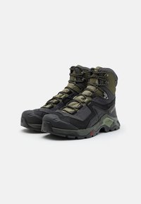 Salomon QUEST ELEMENT GORE TEX - Hiking shoes - black/deep lichen green/olive night