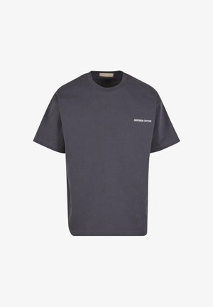 Tumehallist puuvillast T-särk, ümar kaelus, lühikesed varrukad ja valge kiri "ANOTHER COTTON" vasakul rinnal.