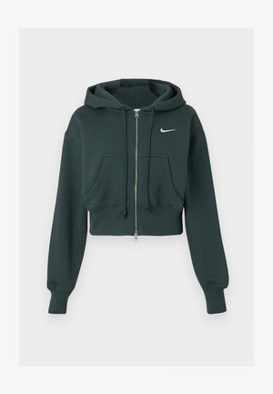 Lühendatud tume roheline kapuutsiga dressipluus, mis on valmistatud pehmest kangast, omades esist lukku, suuri eesmysse ja valget Nike logo rinnal.
