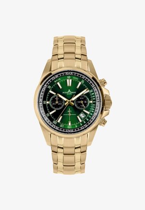 Reloj cronógrafo en tono dorado con esfera verde, subesferas negras y marcadores luminosos; pulsera de metal con acabado pulido.