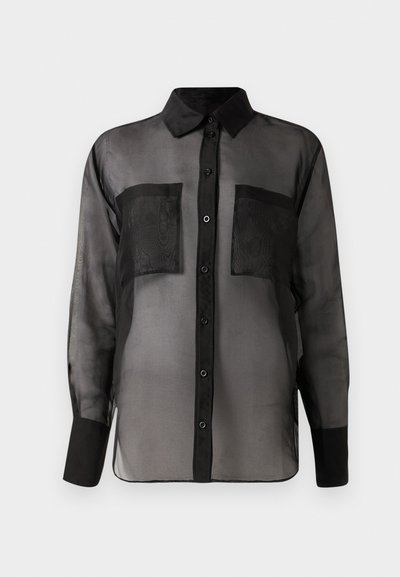 Black sheer long-sleeve button-up shirt with two front chest pockets and solid black collar and cuffs.