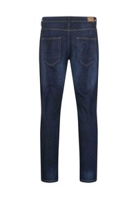 Jeans in denim blu scuro con vestibilità slim, dotati di due tasche posteriori e cuciture a contrasto. Etichetta visibile in vita.