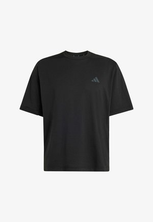 Schwarzes kurzärmeliges T-Shirt aus Baumwolle mit Rundhalsausschnitt und einem dezenten dunklen Logo auf der linken Brust.