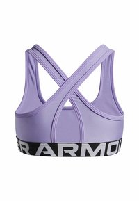 Lavendlivärvi spordibra, millel on ristuvad rihmad, sile tekstuur ja must elastne riba, millel on valge "UNDER ARMOUR" logo. Tugevdatudõmblused.