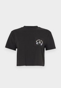 Black cropped t-shirt made of cotton, featuring a round neckline and short sleeves. Left chest pocket with embroidered logo and floral design.