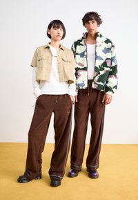 Rains ADDIS PANTS WIDE UNISEX - Tepláky - frame