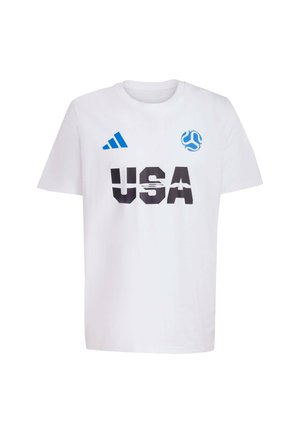 White cotton T-shirt featuring "USA" in bold black letters, blue accents, and an Adidas logo on the left shoulder. Short-sleeved design.