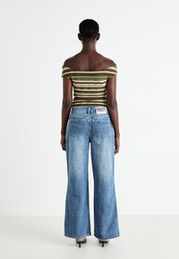 The Ragged Priest RELEASE BLEACHED BLUE WASH - Široke nogavice - blue denim