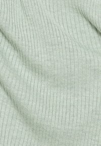 Light green ribbed fabric, featuring a soft texture and subtle sheen, with vertical lines creating a consistent pattern throughout.